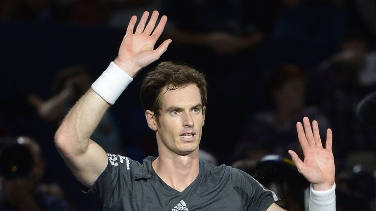 Andy Murray celebrates winning the third round match at the Paris Masters