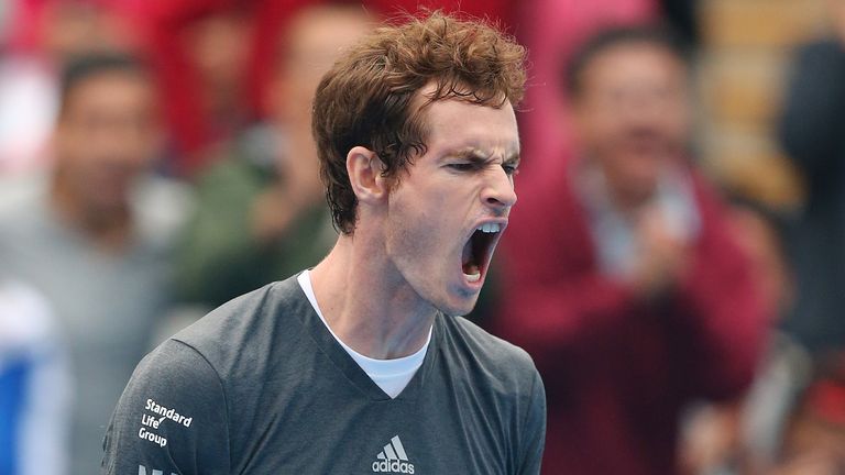 Andy Murray celebrates winning his match against Marin Cilic of Croatia during day seven of the China Open