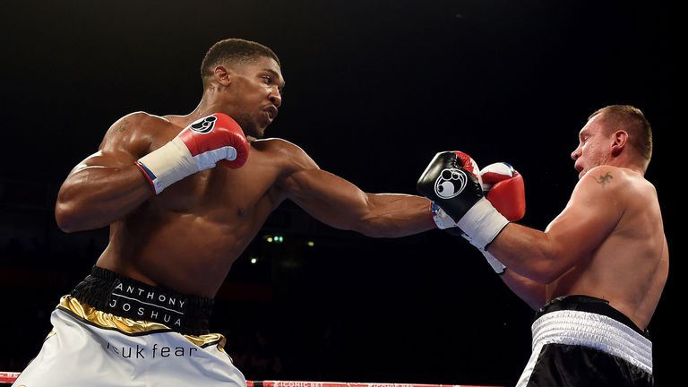 Anthony Joshua (left) in action with Konstantin Airich during the Heavyweight bout at the Manchester Arena, Manchester.