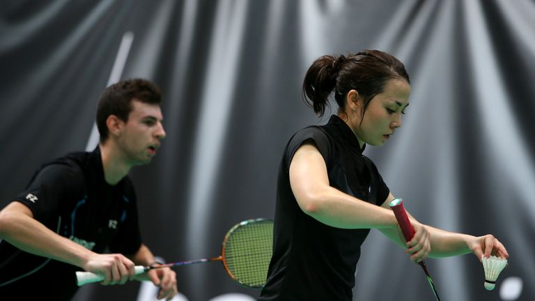 Alyssa Lim (R) and Christopher Coles (L) of England in action during Day Two of the London Badminton Grand Prix