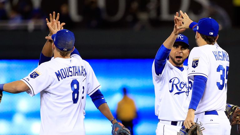 The Kansas City Royals celebrate after defeating the San Francisco Giants