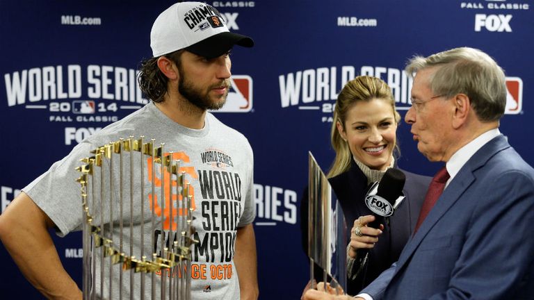 Madison Bumgarner of the San Francisco Giants is presented with the the MVP trophy by Commissioner Bud Selig