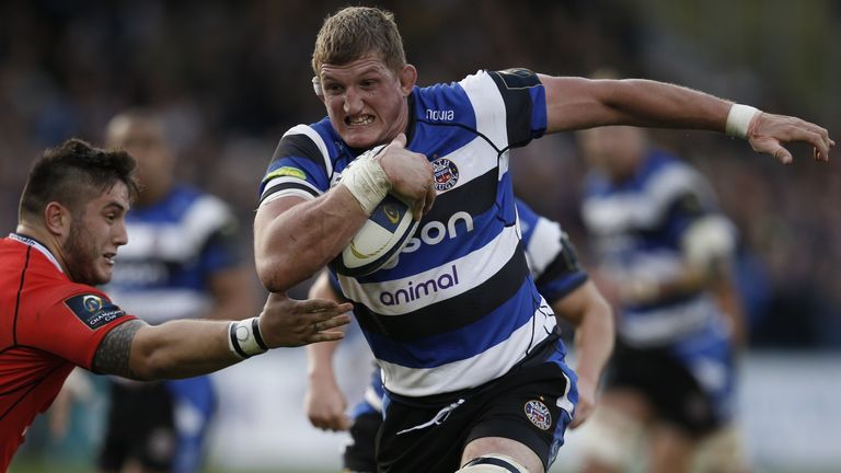 Bath's English lock Stuart Hooper runs with the ball during the European Rugby Champions Cup match between Bath Rugby and Toulouse at The Recreation Ground