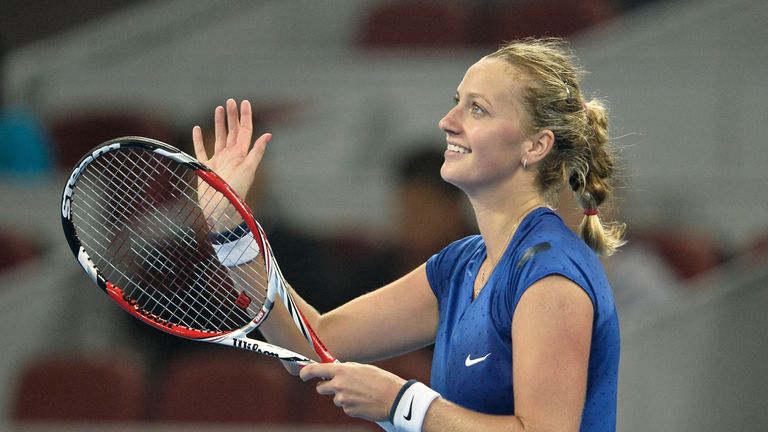 Petra Kvitova of the Czech Republic reacts after beating Samantha Stosur of Australia during their women's singles semi-final match at the China Open tenni