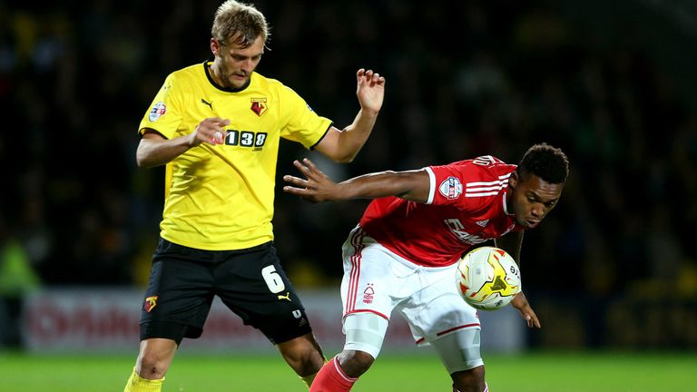 Nottingham Forest's Britt Assombalonga holds off Watford's Joel Ekstrand