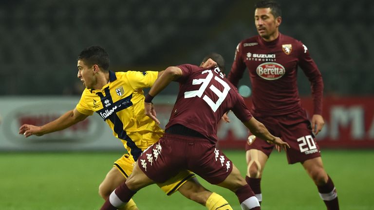 Bruno Peres (R) of Torino FC competes with Jose Mauri of Parma FC during the Serie A match