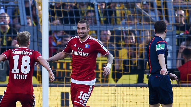 DORTMUND, GERMANY - OCTOBER 04:  Pierre-Michel Lasogga of Hamburger SV celebrates as he scores the 