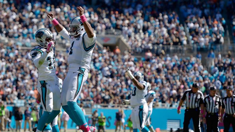 Cam Newton and Philly Brown of the Carolina Panthers celebrate after Brown's touchdown against the Chicago Bears