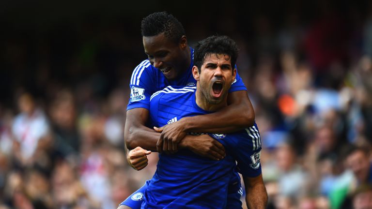 Diego Costa celebrates scoring Chelsea's second goal, set up by Cesc Fabregas, to make it 2-0