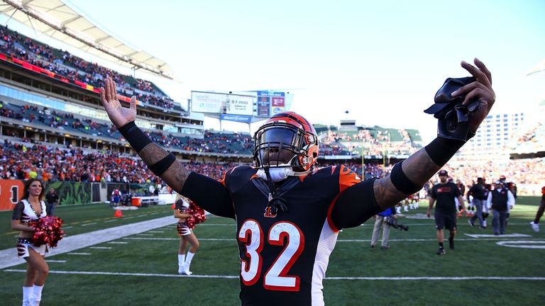 Jeremy Hill #32 of the Cincinnati Bengals celebrates as he walks off of the field after defeating the Baltimore Ravens 27-24