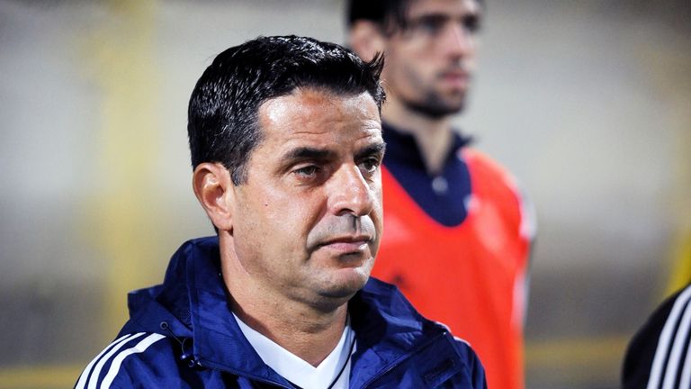 Cyprus coach Charalampos Christodoulou looks on during the line up for the national anthem prior to the friendly football match Croatia v Cyprus
