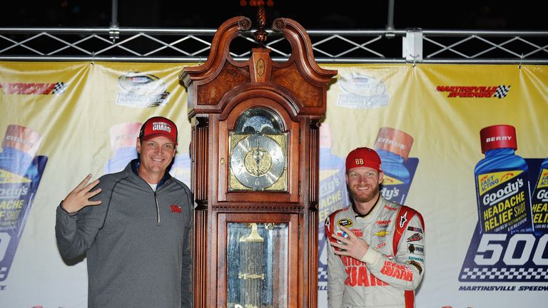 Dale Earnhardt Jr and crew chief Steve Letarte pose with the trophy in Martinsville