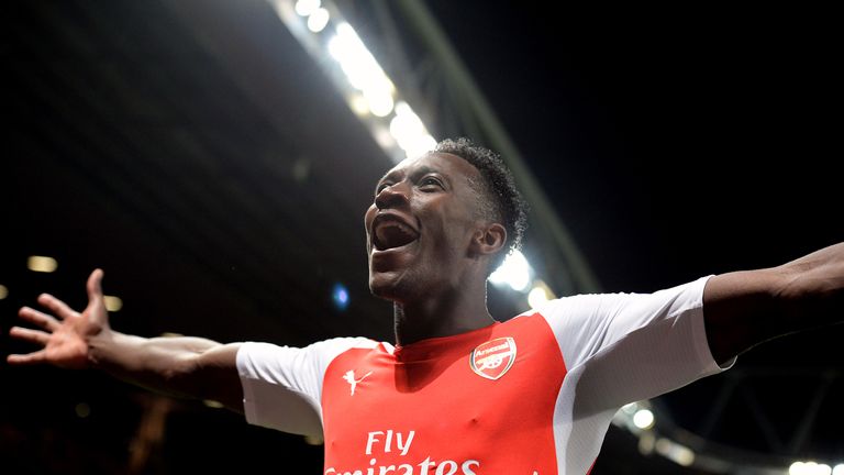 Arsenal's Danny Welbeck celebrates scoring his side's fourth goal to complete his hat-trick during the UEFA Champions League match at The Emirates Stadium,
