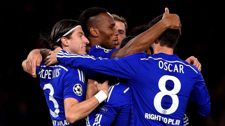 Didier Drogba is congratulated after making it 2-0 with a coolly-taken penalty