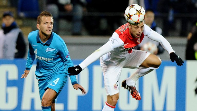 Zenit's Domenico Criscito (L) vies with Monaco's Dimitar Berbatov (R) during their UEFA Champions league group C football match in Saint Petersburg