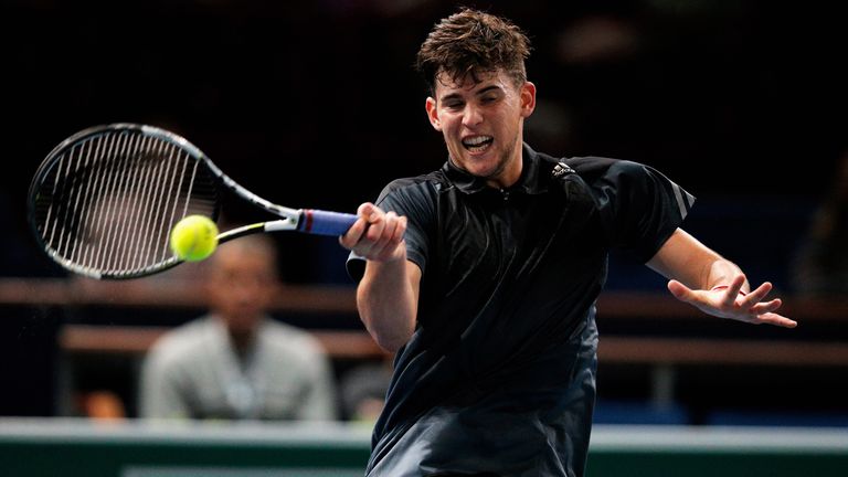 Dominic Thiem of Austria in action against Alexandr Dolgopolov during day one of the BNP Paribas Masters