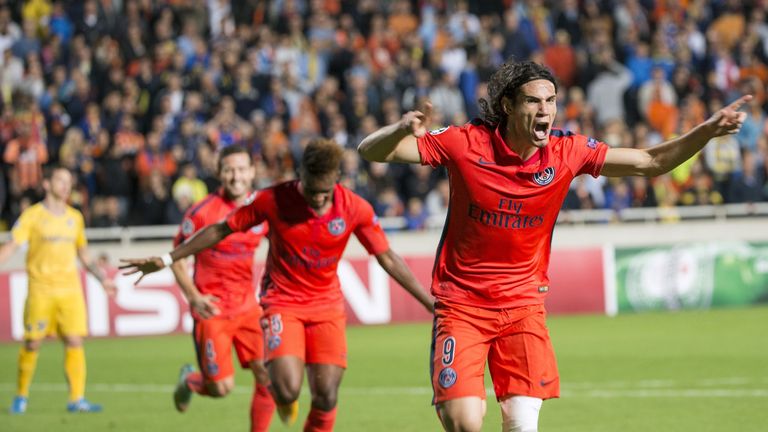 Paris St Germain's striker Edinson Cavani celebrates after scoring his late winner against APOEL
