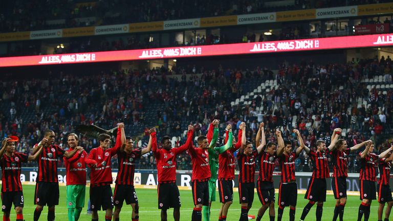 Eintracht Frankfurt players celebrate victory over Cologne