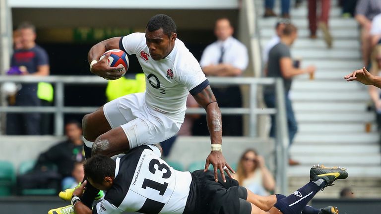 LONDON, ENGLAND - JUNE 01:  Rene Ranger of the Barbarians tackles Semesa Rokoduguni of England during the Rugby Union International Match between England a