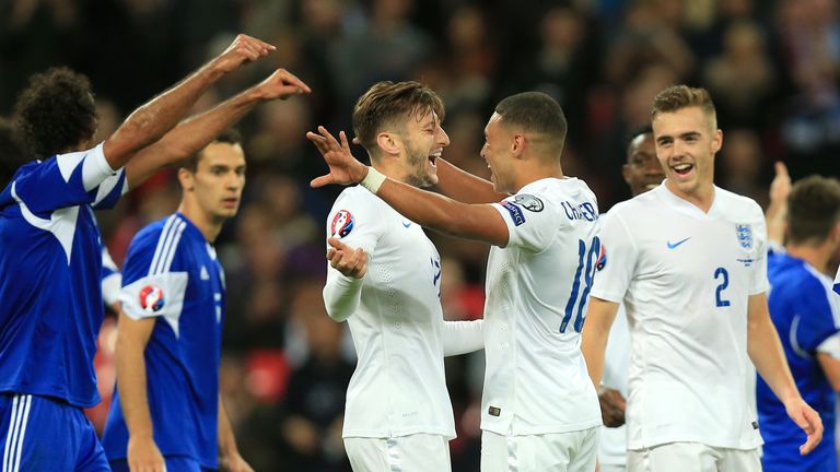 England's Adam Lallana (left) and Alex Oxlade-Chamberlain celebrate their team's fourth goal of the game which was later disallowed v San Marino