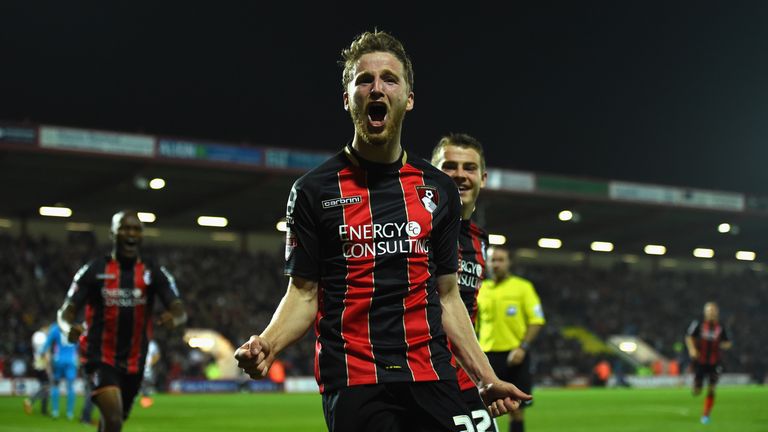 Eunan O' Kane celebrates after opening the scoring for Bournemouth against West Brom