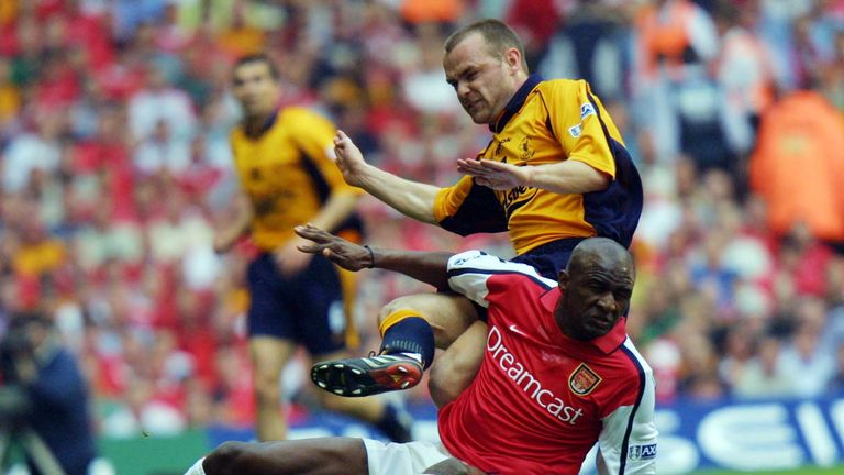 Arsenal's Patrick Vieira (bottom) is tackled by Liverpool's Danny Murphy (top) during the FA Cup final at The Millennium Stadium 