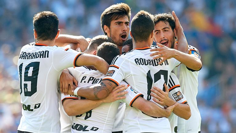 VALENCIA, SPAIN - OCTOBER 04: Players of Valencia celebrate the first goal during the La Liga match between Valencia CF and Club Atletico de Madrid at Esta