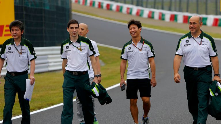 Kamui Kobayashi walks the track