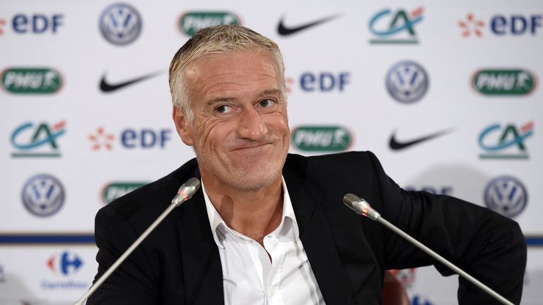 French football team coach Didier Deschamps reacts during a press conference at the French football federation headquarters in Paris