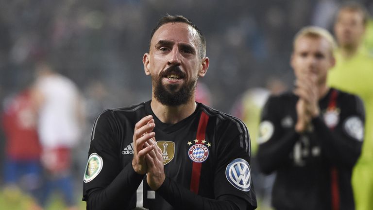 Bayern Munich's French midfielder Franck Ribery (L) applauds after the German Cup DFB football match 