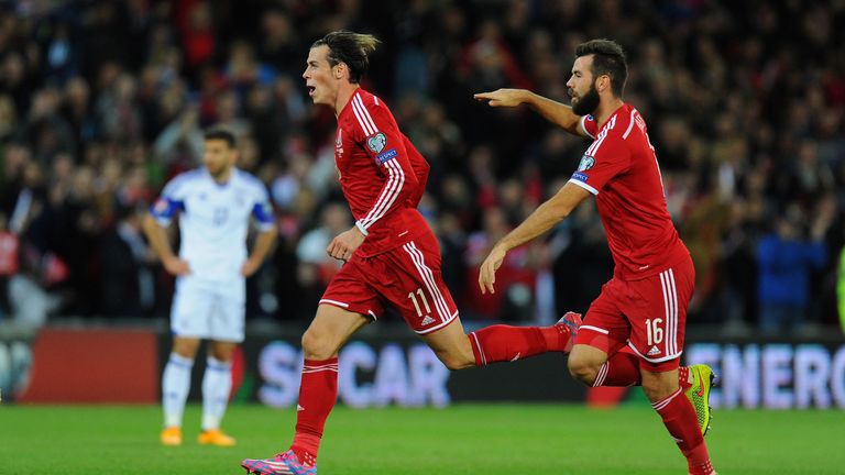 Wales players Gareth Bale (L) and Joe Ledley celebrate a goal