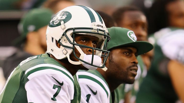 Quarterbacks Geno Smith #7 of the New York Jets and Michael Vick #1 look on