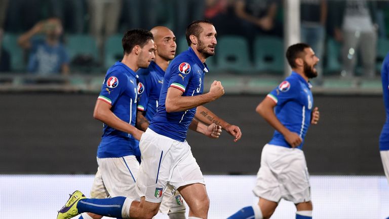 Giorgio Chiellini of Italy (C) celebrates after scoring the second goal during the EURO 2016 Group H Qualifier match against Azerbaijan in Palermo