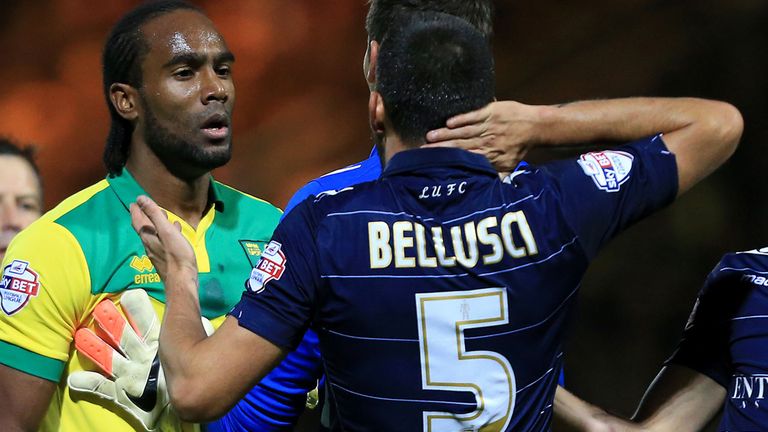 Norwich City's Cameron Jerome and Leeds United's Giuseppe Bellusci have an altercation during the Sky Bet Championship match at Carrow Road