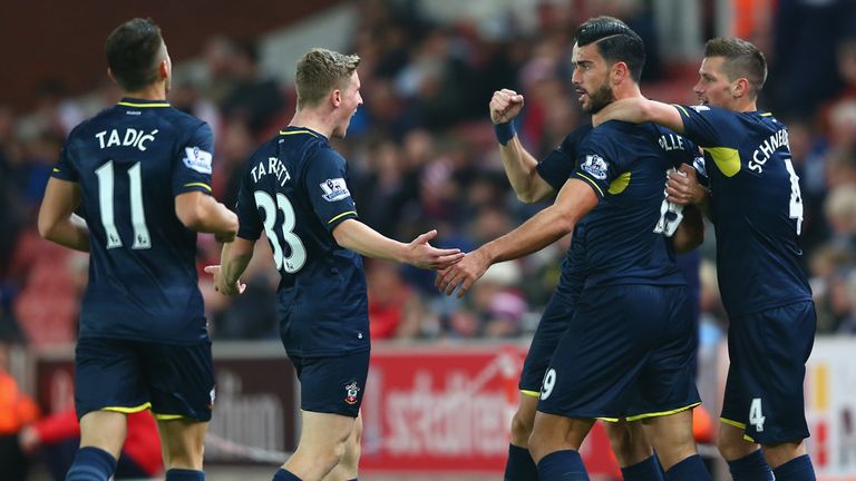Graziano Pelle (2R) of Southampton celebrates with team mates after scoring the opening goal during the Capital One Cup fourth round match