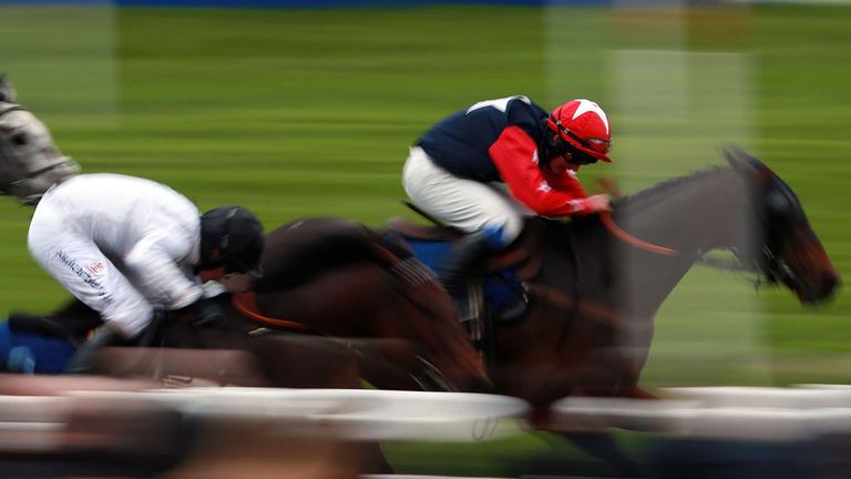 Roman Flight on his way to victory in the giftofracing.co.uk Conditional Jockeys' Handicap Hurdle