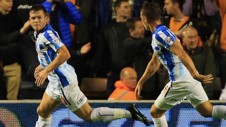 Huddersfield Town's Harry Bunn (left) celebrates scoring his sides first goal at Wolves