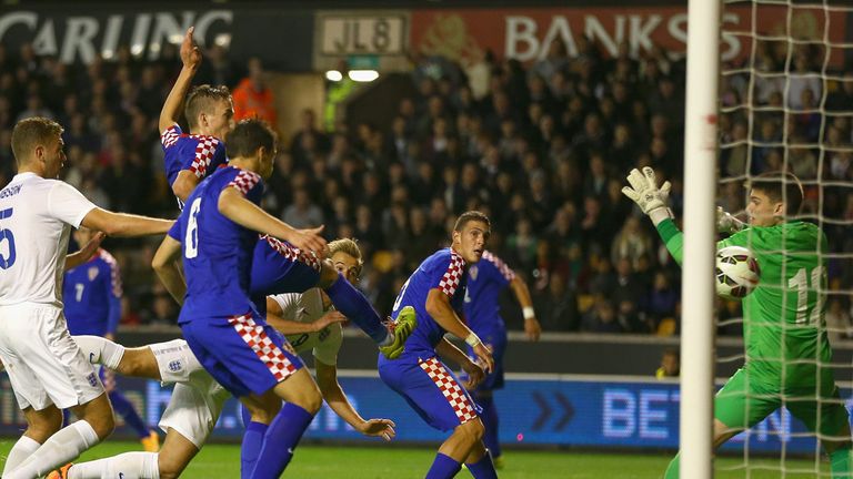 Harry Kane of England scores