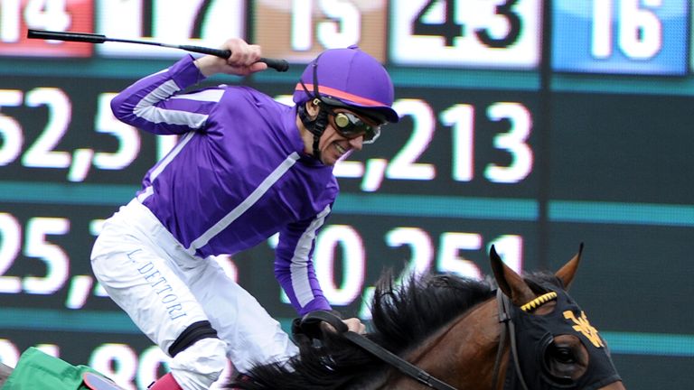 ARCADIA, CA - OCTOBER 31:  Lanfranco Dettori reacts to his win atop Hootenanny during the 2014 Breeder's Cup Juvenile Turf at Santa Anita Park on October 3