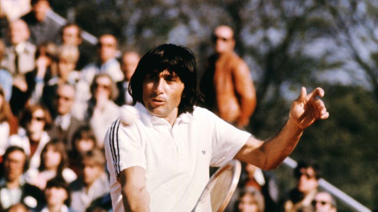 An undated and unlocated picture shows Romanian Ilie Nastase returning a ball during a Davis Cup tournament. 