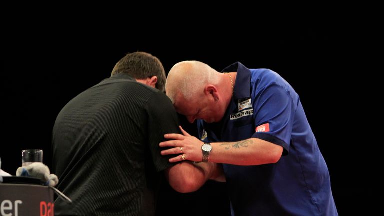 James Wade and Robert Thornton salute their nine dart finishes