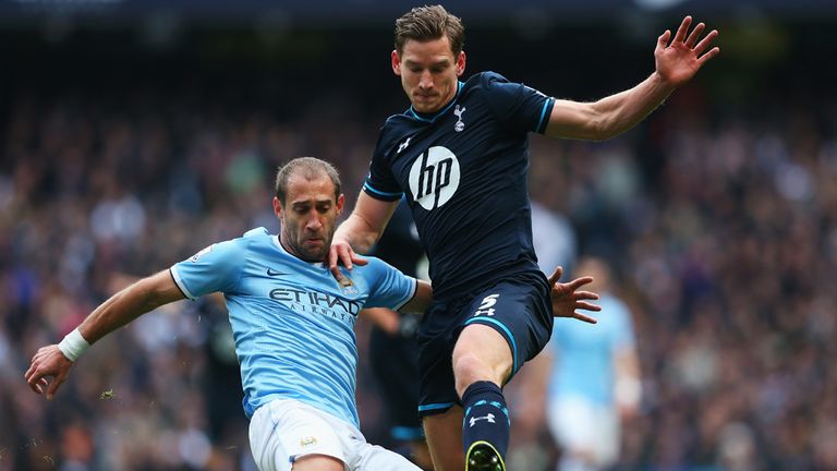 Jan Vertonghen of Tottenham Hotspur challenges for the ball with Pablo Zabaleta of Manchester City 