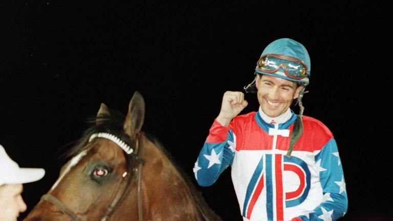 Jerry Bailey celebrates after winning the 1996 Dubai World Cup with Cigar