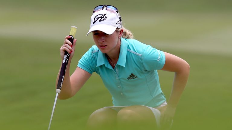 Jodi Ewart Shadoff of England lines for a putt on the 17th hole during day two of the Sime Darby LPGA at Kuala Lumpur