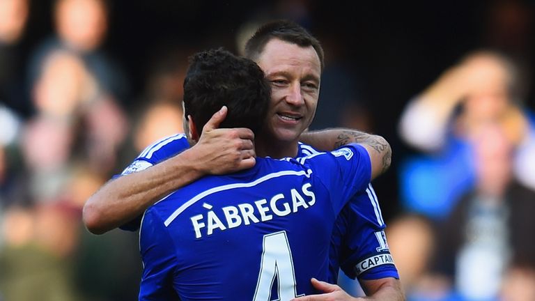 John Terry hugs Cesc Fabregas of Chelsea after victory during the Barclays Premier League match between Chelsea and Arsenal 