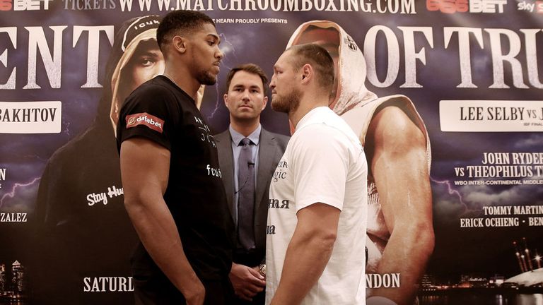 Anthony Joshua and Denis Bakhtov square up ahead of their fight on Saturday.