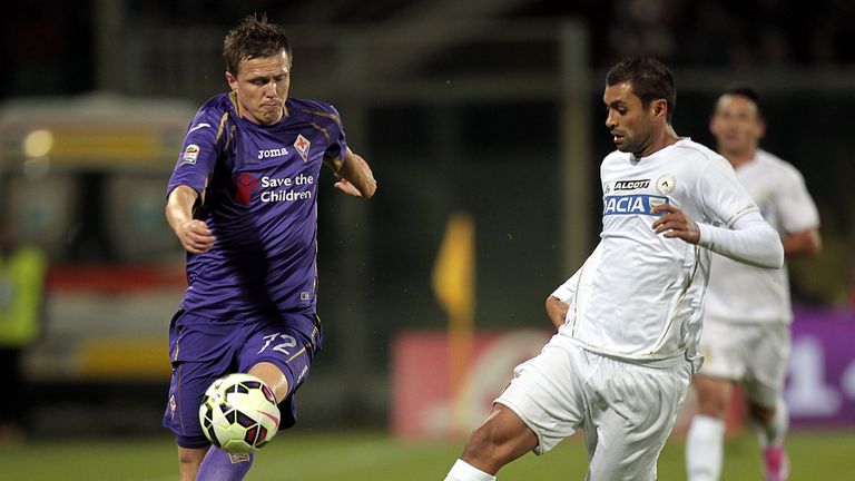 Josip Ilicic of ACF Fiorentina battles for the ball with Danilo of Udinese Calcio during the Serie A match
