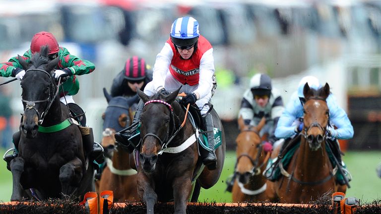 LIVERPOOL, ENGLAND - APRIL 04: Barry Geraghty riding Josses Hill clear the last to win The International Festival For Business 2014 Top Nivices' Hurdle Rac