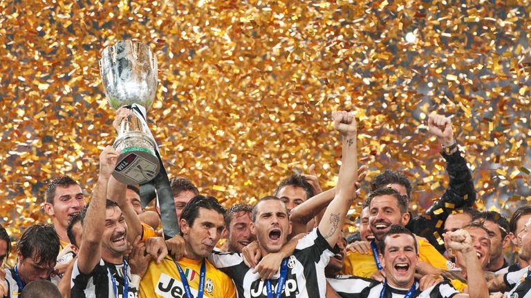 Juventus celebrate their win against SSC Napoli during their Italian Super Cup football match in Beijing in 2012.