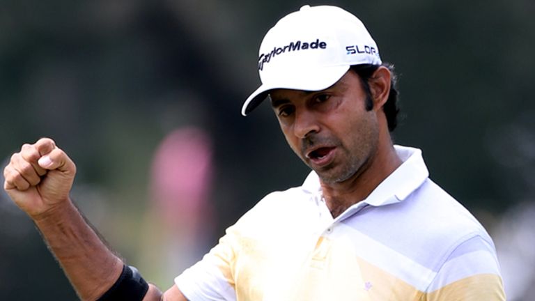 HONG KONG - OCTOBER 16:  Jyoti Randhawa of India reacts after sinking a birdie on the 18th hole during the first round of the 2014 Hong Kong open at The Ho
